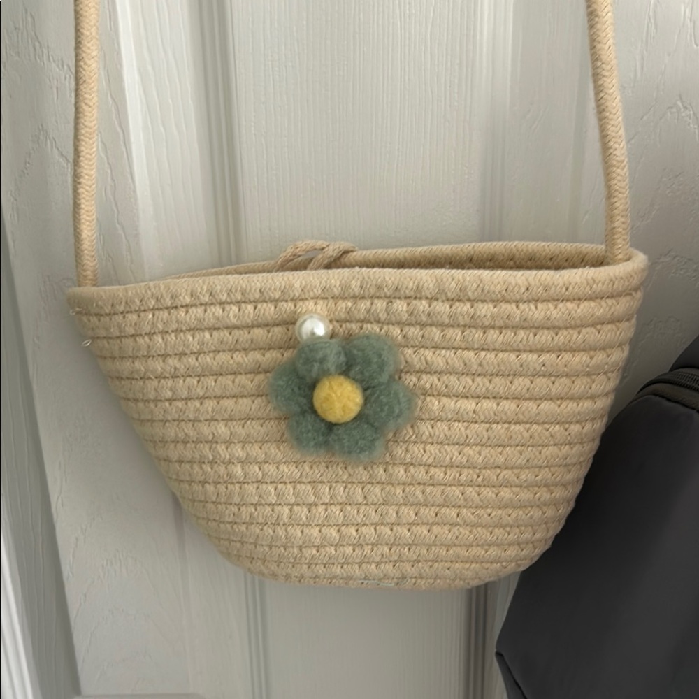 Chic Tan Woven Shoulder Bag with Floral Accent